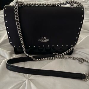 Klare crossbody bag in signature canvas with rivets